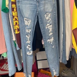 American eagle jeans light blue wash with rips very stretchy!